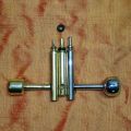 Two brass Crosman bolts with Leupy Stainless equivalent 